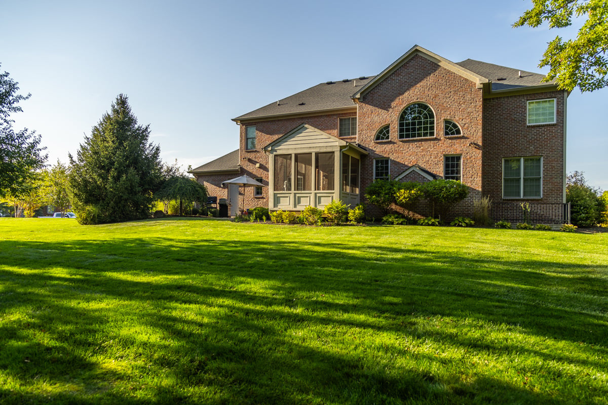 a beautiful green lawn in front of a lafayette, IN home