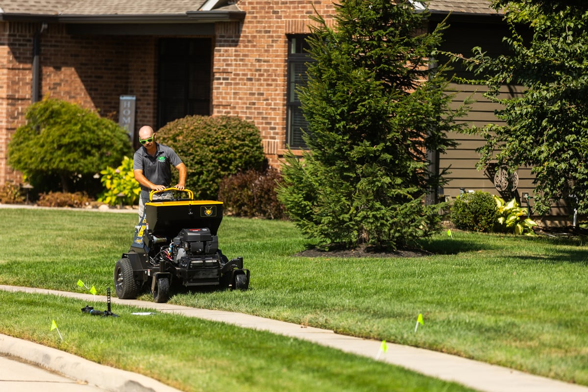 technician aerate home overseed service 3